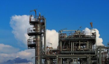 petroleum-oil-refinery-barrel-tank-petrochemical-plant-factory-chemical-industry-oil-and-gas-petr-e1702467416149